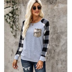 Woman’s small gingham top with gold sequin pocket.